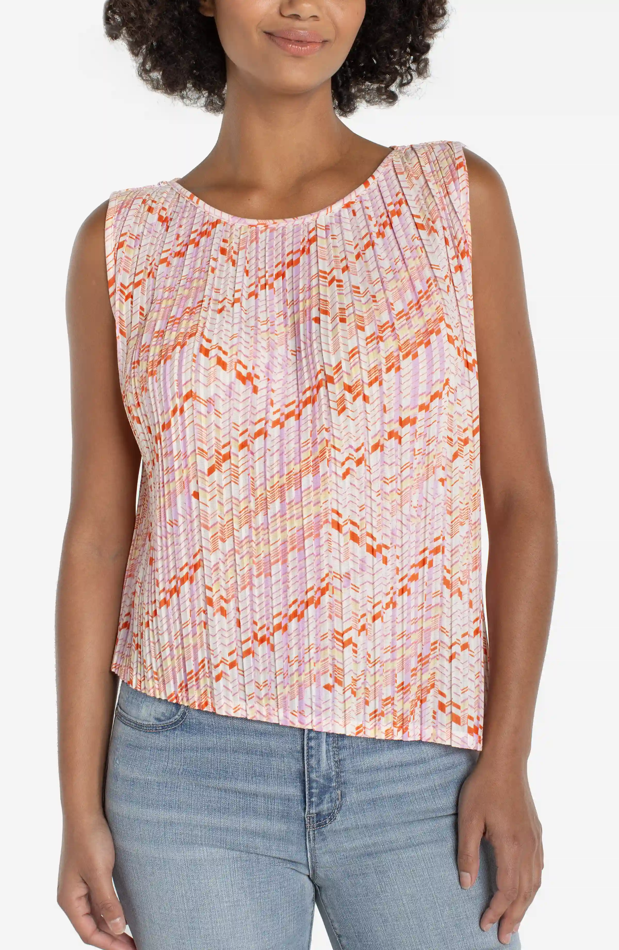 SLEEVELESS ASYMMETRIC HEM KNIT TOP